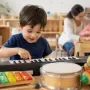 Preschool Child Discovering Music at a Keyboard